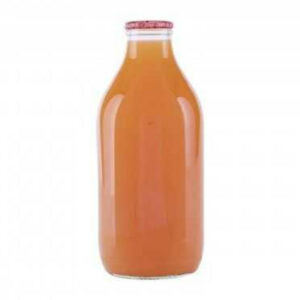 One pint of grapefruit juice in a glass bottle