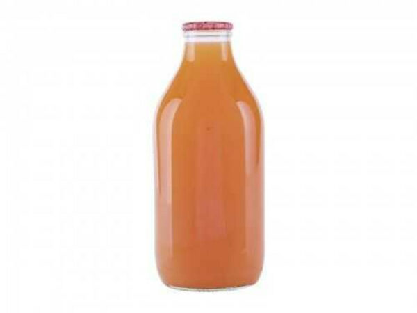 One pint of grapefruit juice in a glass bottle