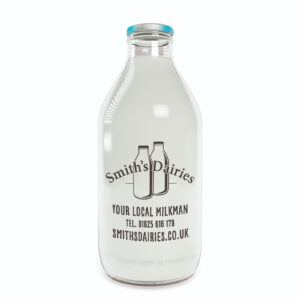 Smiths Dairies logo on organic skimmed milk bottle