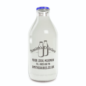 Logo for Smiths Dairies on a blue bottle