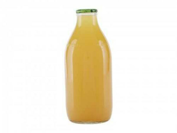 Glass pint bottle of apple juice